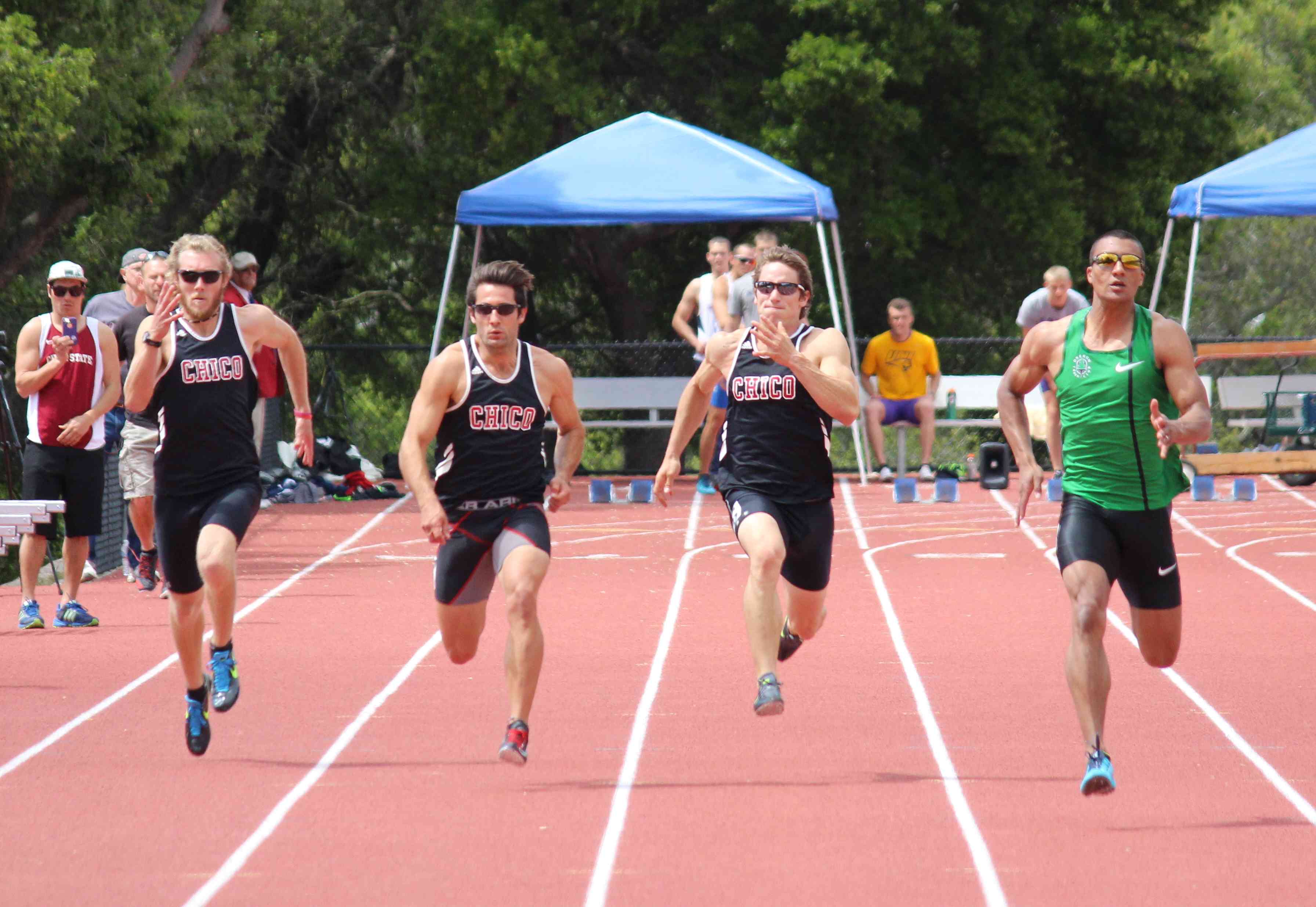 Locking horns with the reigning Olympic Champion, Ashton Eaton in the 100m. (L-R) Brunk, Elsenbaumer and Smith